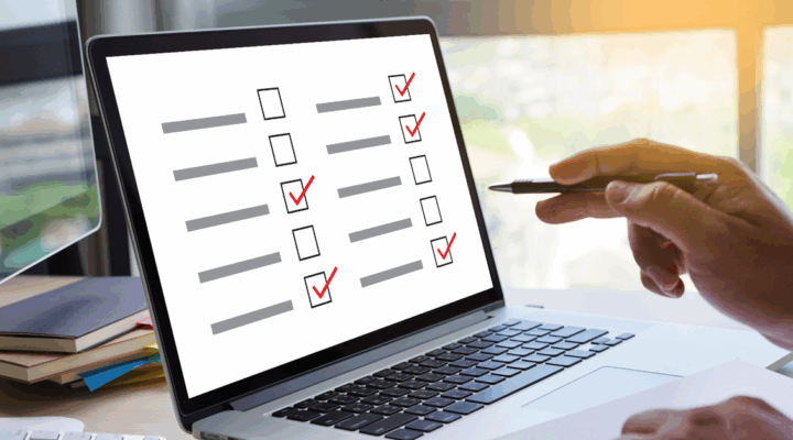 person using a stylus on laptop touch screen